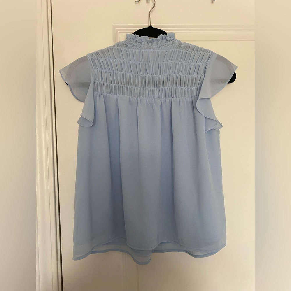 Blue ruffle blouse